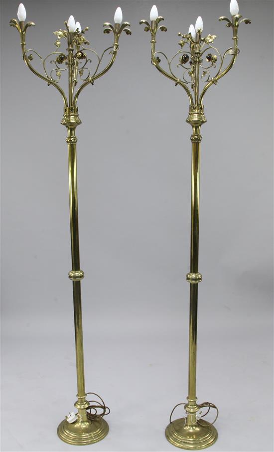 A pair of ecclesiastical gothic style floor lamps, 6ft 7in., adapted